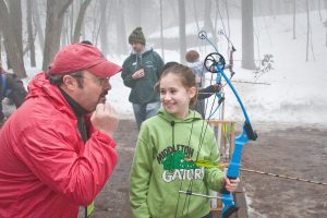 4 h staff and member at shooting sports event