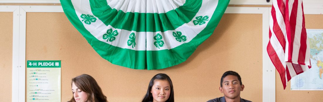 4-H club officers at table