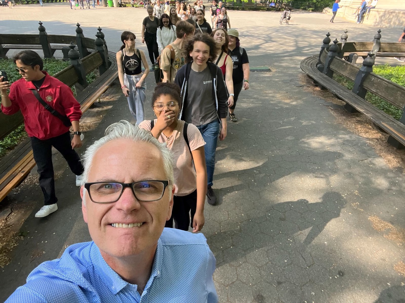 Jay with many youth behind him