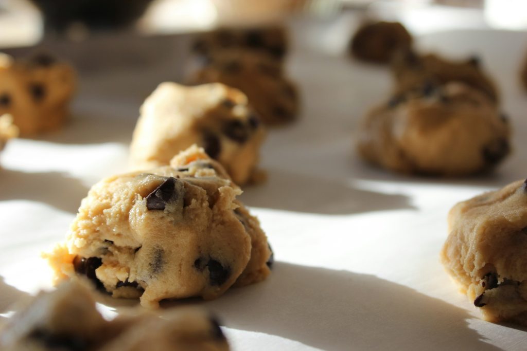 cookie dough resting on a baking sheet