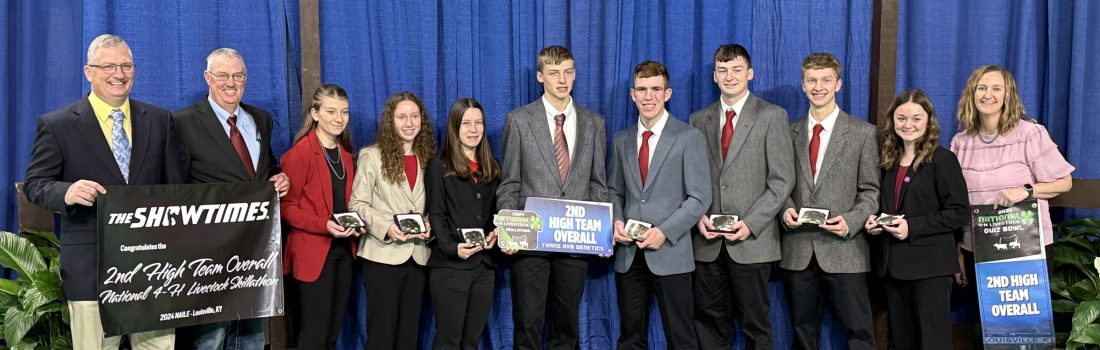 Photo of the Reserve National Champions for Livestock. Left to Right: Ron Patterson, Dennis Patterson, Gwen Riedl, Leah Patterson, Iris Adams, Aiden Patterson, Michael Edgington, Cameron Patterson, Luke Patterson, Libby Vogt, and Bernie O’Rourke Patterson