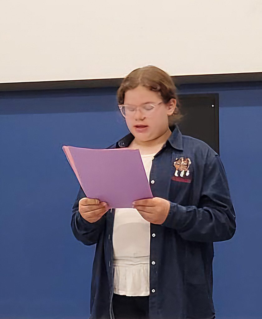 image of girl reading speech