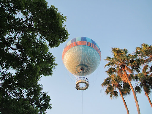 Hot air balloon rising through the sky.