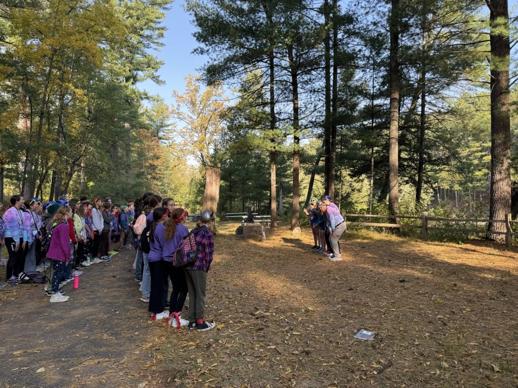 Large group gathering outside at Arts Camp